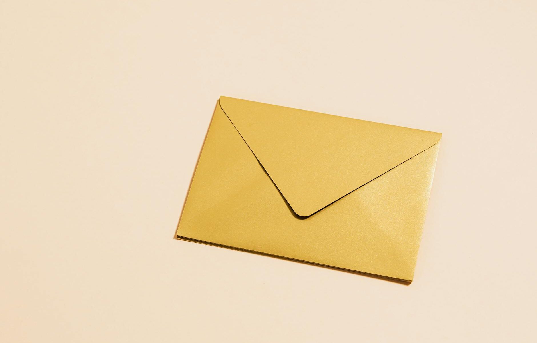 closed envelope on yellow background